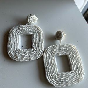 Fashion statement earrings. About 3in long, felt back.